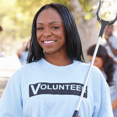 team-of-volunteers-picking-up-litter-in-suburban-s-P49KBMZ.jpg